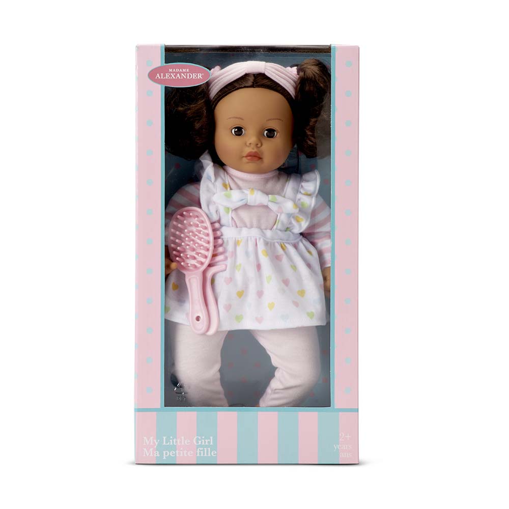 doll with hairbrush in packaging