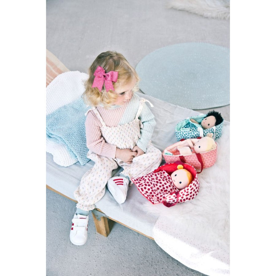 Compare skin tones between Ari, a biracial doll next to the Agathe doll which is white