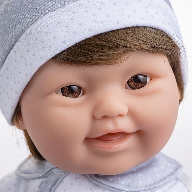close up of the face of our new Boy Down Syndrome doll