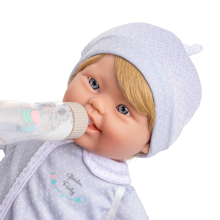 Our blonde baby boy down syndrome doll with disappearing milk baby bottle toy