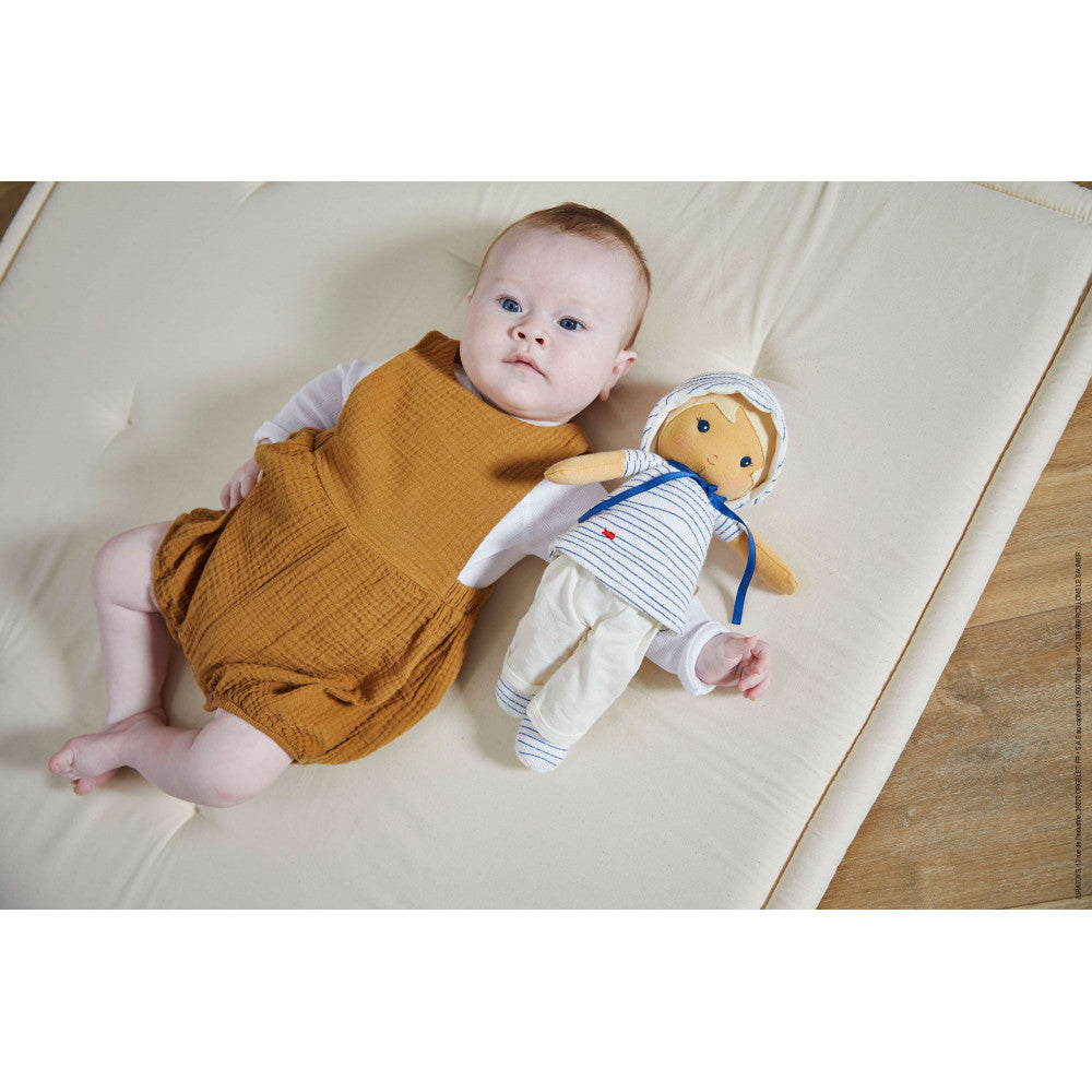 Eli Boy Doll by Kaloo with model