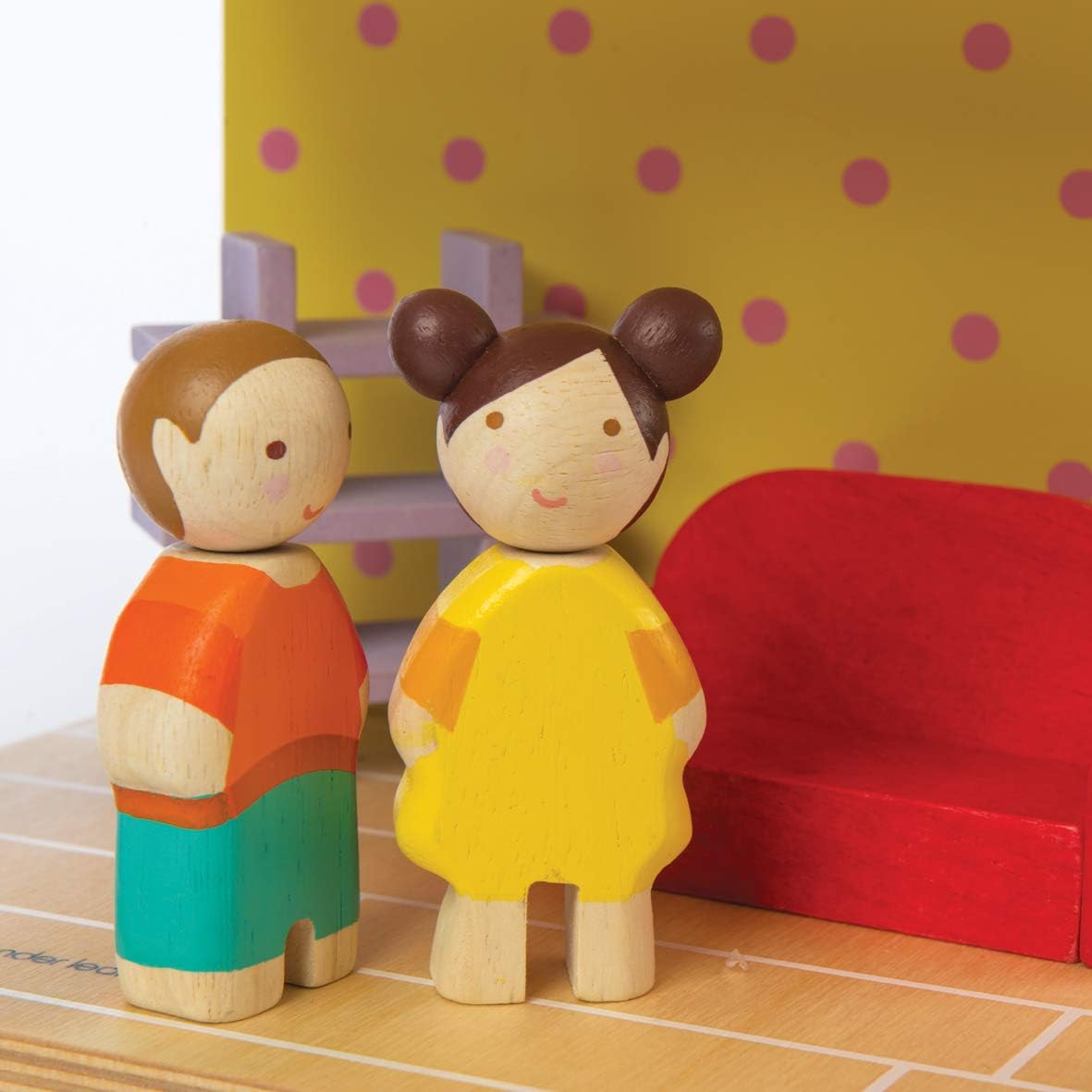 two wooden dollhouse dolls