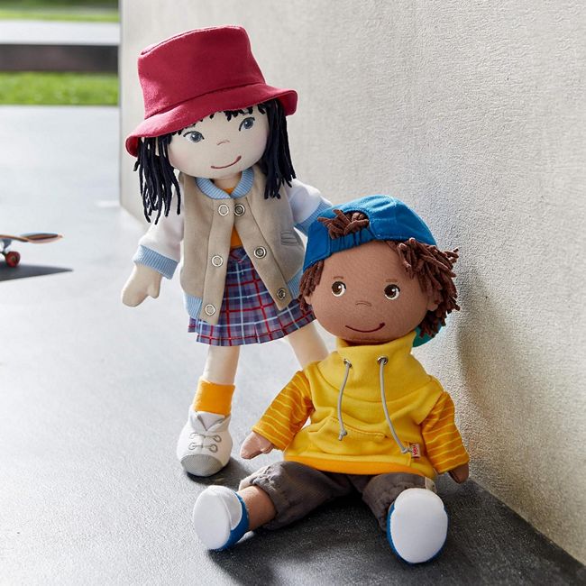 Two HABA dolls William a black boy doll and Yuki an Asian girl doll