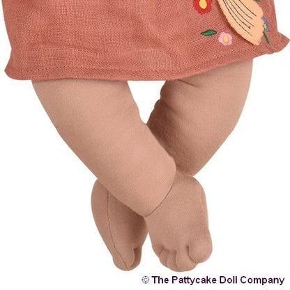 detail of the soft sculpt features of our Black Baby Rag Doll