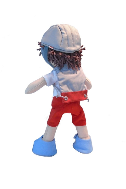 A rear view of a a2 inch boy's doll wearing the new HABA Bike outfit