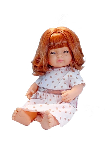 Chris's cousin is also a redheaded doll. She is Shannon and comes in a 15 inch golden polka dot doll dress
