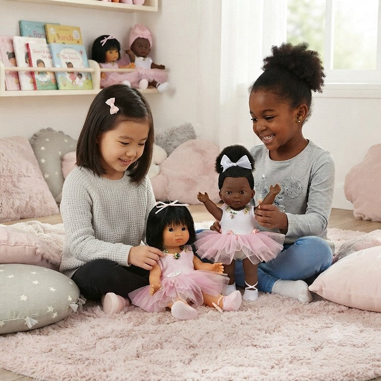 A black child and an Asian child playing together with their ballerina dolls