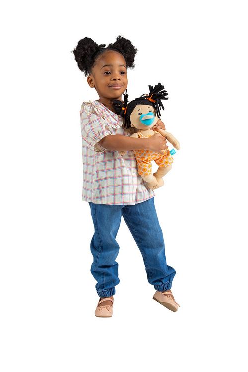 A young Black Girl Cuddling her Baby Stella Asian Baby Doll