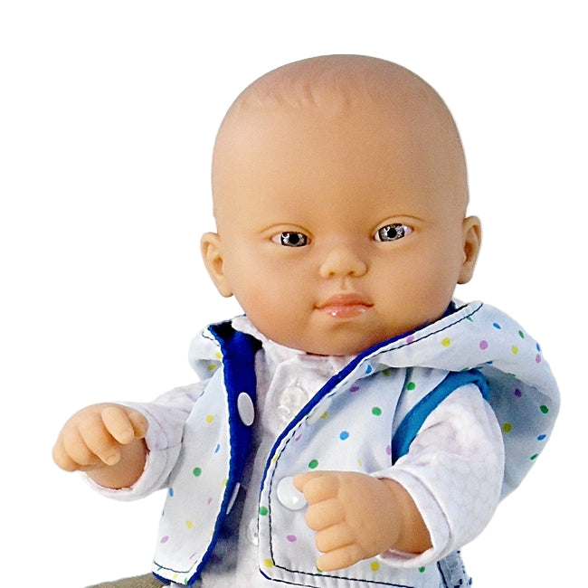 Down Syndrome Baby Boy doll portrait close up of face and blue eyes
