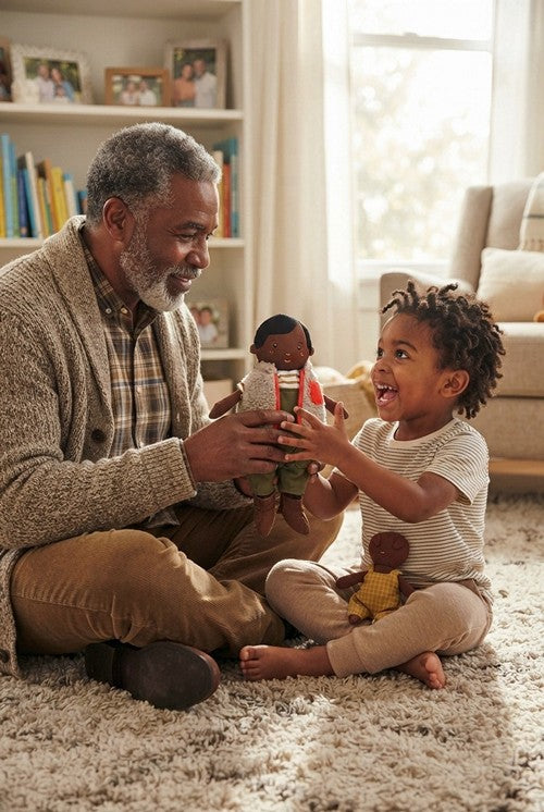 A Black Grandfather is giving his grandson an Ellis Black Boy Rag doll as a gift