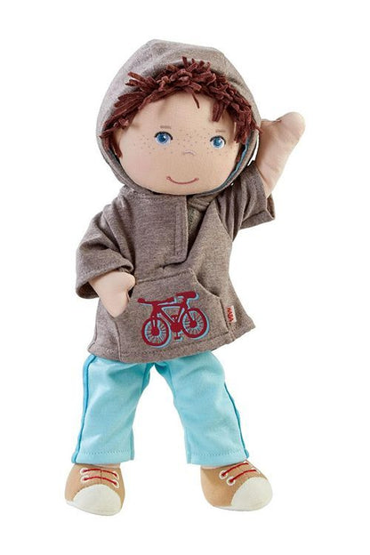 Bright blue eyes and friendly smile on Liam a toddler boy's 12 inch cloth doll