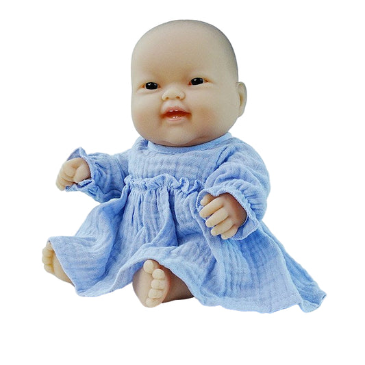 a chubby lovey asian baby doll in a blue knit dress
