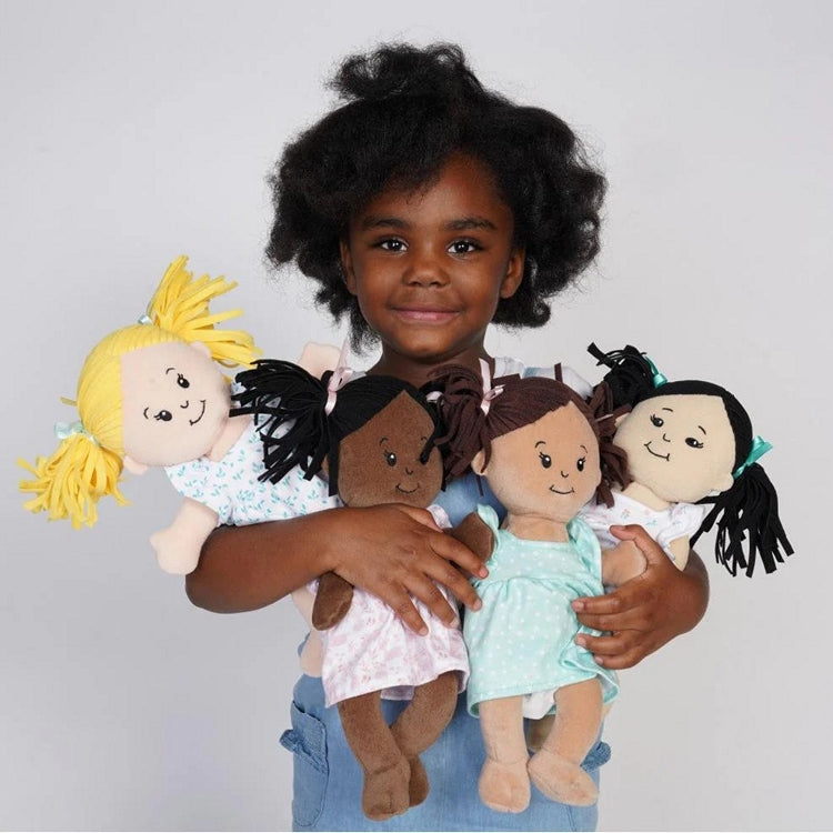 All the Love Stella dolls hel by young model