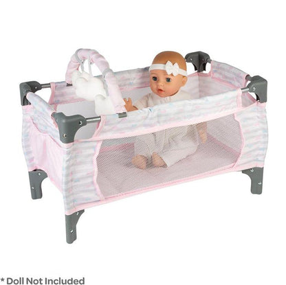 Shows doll's bassinet with baby doll and clip on mobile