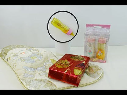 YouTube video of disappearing milk bottles in action in Christmas Setting