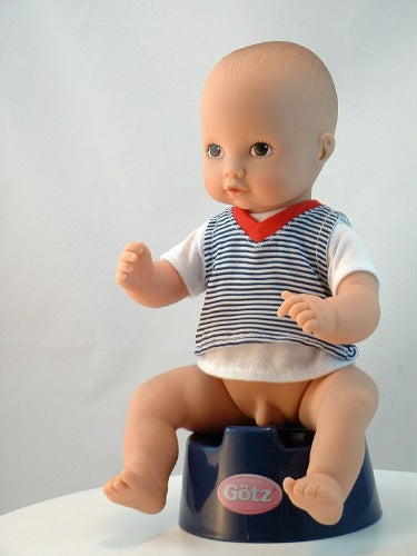 Anatomically Correct baby Boy Doll sitting on doll potty