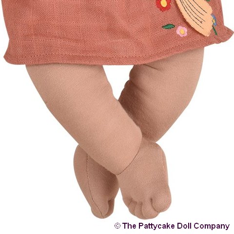 detail of the soft sculpt features of our Black Baby Rag Doll