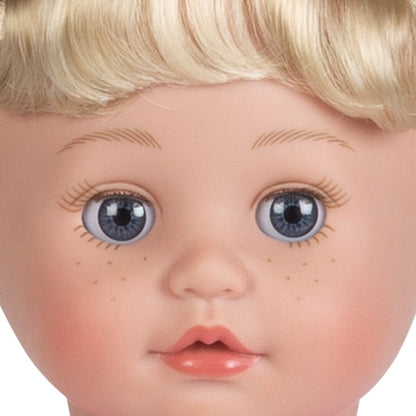 Close up portrait of our new Cuddle & Coo cry baby doll by Adora