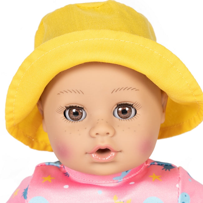 Cloes up portrait of the new Beach Babies dolls with sun activated freckles and blushed cheeks