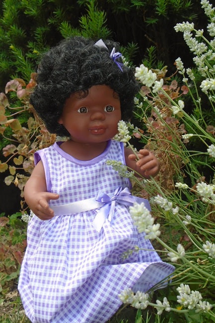 lifestyle photo of Jazz, our beautiful 15 inch Black Baby doll