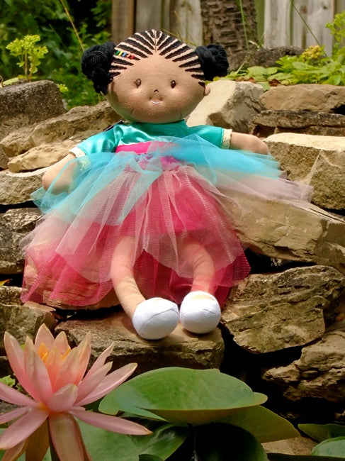 Kessie by Bonikka is a cloth doll with embroidered on cornrows