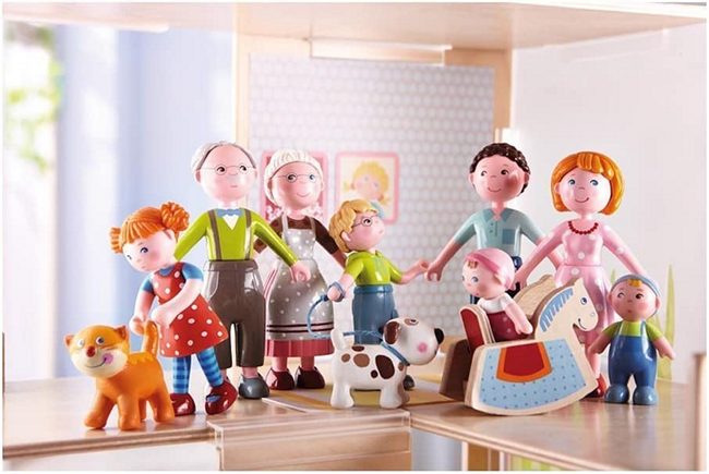 a dollhouse pretend family of HAbA doll house dolls