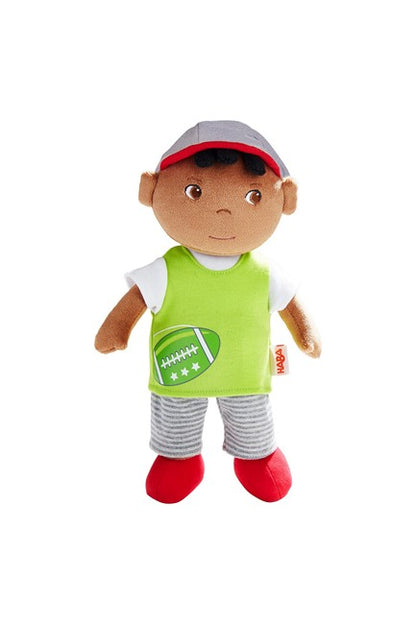 A young black boy's toddler rag doll