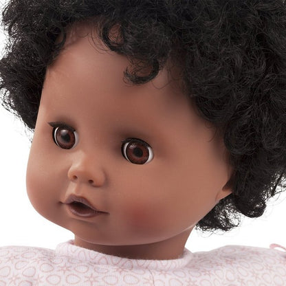 A close up portrait of the beautiful black baby doll with hair made by Gotz