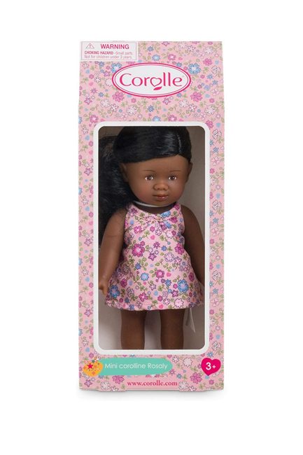 The small black doll with hair to brush in her gift box packaging