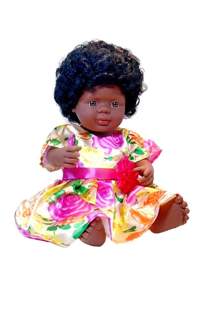 Jazz a black doll with natural hair posed in our Island Breezes dress