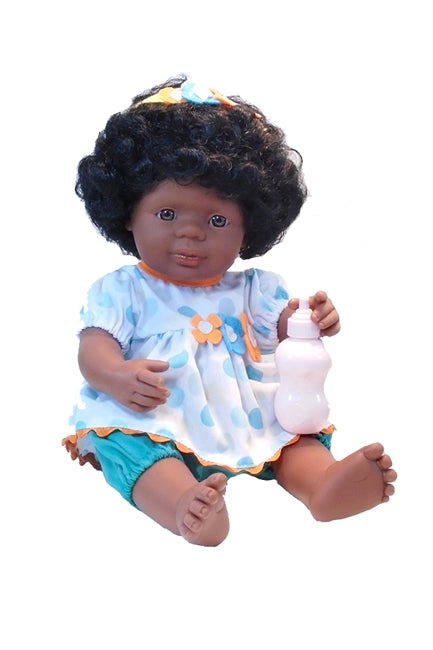 an african american baby doll with natural hair in our big blue dots outfit
