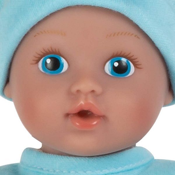 a close up of the face of the baby boy doll Blue eyed Baby Boy BAby tots doll